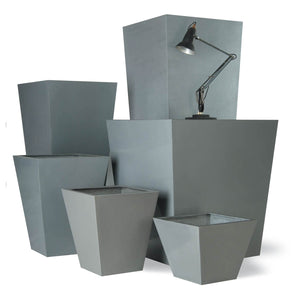 Geo Modern Tall tapered planters, textured grey faux lead finish. Tall planters for gardens, balcony and terraces as well as indoor spaces such as office interiors.